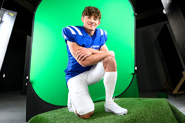 Buffalo Joe in front of the green screen and elevated turf