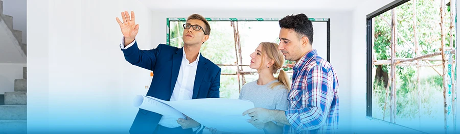 Couple reviewing building plans